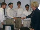 The AREC team, from left: Dean LaBarba, KI6CUX; Saheem Abushousheh, KI6HCM; David Strachan-Olsen, KI6UXJ; Ahir Redding (ready to take test), and CERT Director of Education Sibyl Keirns, KA6RXX, after the team’s <em>PowerPoint  </em>presentation. [Devon Day, KF6KEE, photo]
 